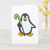 ホッケーでホッケーのスティックを持つペンギン カード (黄色い花)