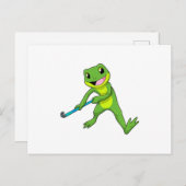 ホッケーでホッケー用のスティックを持つカエル ポストカード (正面/裏面)