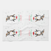 ホッケーのクリスマスのペンギンのサンタの帽子の雪片 キッチンタオル (横)