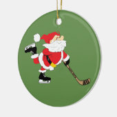 ホッケーのサンタのスケートで滑るのクリスマス セラミックオーナメント (左)