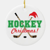 ホッケークリスマスホッケーサンタハットを貼る セラミックオーナメント (裏面)