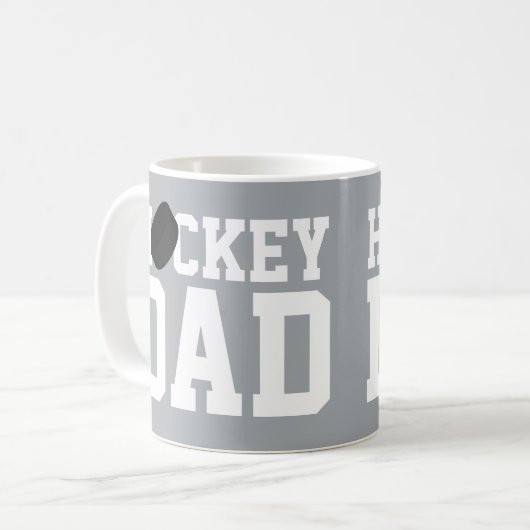 ホッケーパパスポーツアイスホッケーパックコーヒーマグ コーヒーマグカップ (正面左)