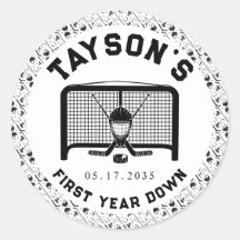 ホッケー1年目を切る1歳の誕生日紙