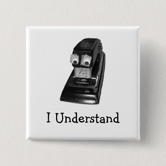 ホッチキス男のピン 缶バッジ (正面)