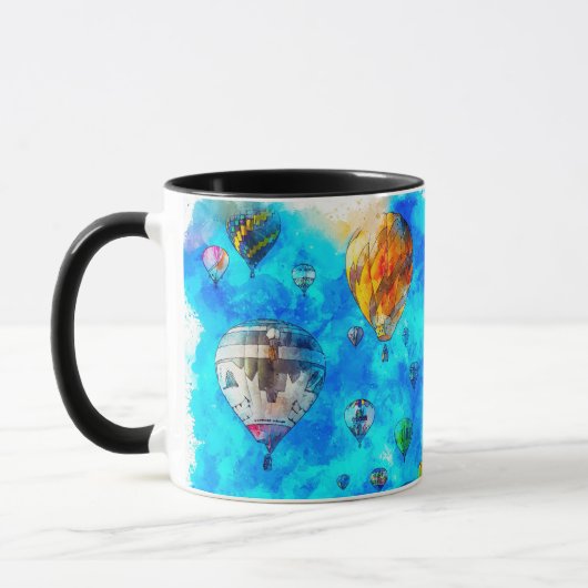 ホットエアバルーンフェスティバルスポーツマンウーマンファミリー マグカップ (左)