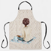 ホットドリンク付き毛布に座っている女性 エプロン (正面)