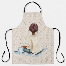 ホットドリンク付き毛布に座っている女性 エプロン