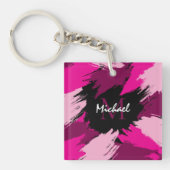 ホットピンクの名前とモノグラムのブラシストロークの色合い キーホルダー (正面)