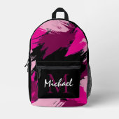 ホットピンクの名前とモノグラムのブラシストロークの色合い プリントバックパック (正面)