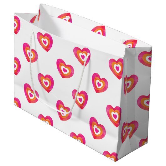 ホットピンクオレンジ色の水色ハートパターン ラージペーパーバッグ (正面アングル)