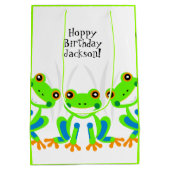 ホッピー誕生日!かわいい緑のカエルの草 ミディアムペーパーバッグ (裏面)