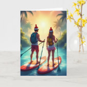 ホリデーアドベンチャーパドルボード – コースタルクリスマス カード (黄色い花)