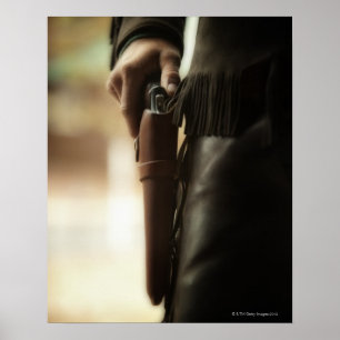 ホルスターの銃を持つカウボーイ ポスター