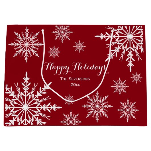 ホワイトウィンタースノーフレークオンレッドハッピーホリデーズ ラージペーパーバッグ (正面)