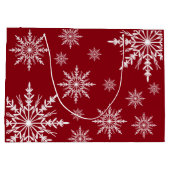 ホワイトウィンタースノーフレークオンレッドハッピーホリデーズ ラージペーパーバッグ (裏面)