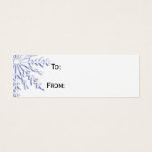 ホワイトギフトの上に青い冬の雪の結晶ラベル (裏面)