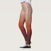 ホワイトグレーオレンジレッドグラデーションストライプラスティック レギンス (左)