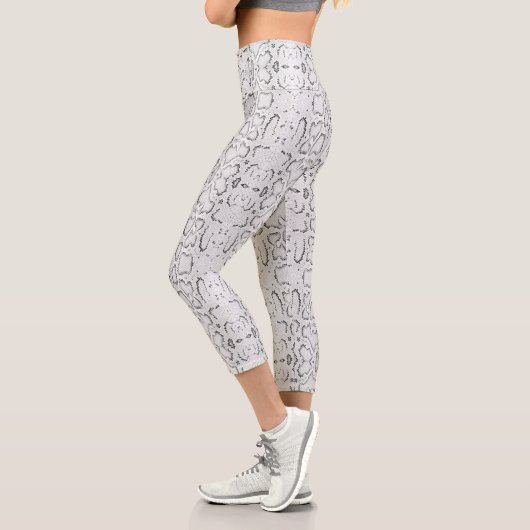 ホワイトシルバーアナコンダスネーケスキン カプリレギンス (左)