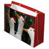 ホワイトダックおもしろいズインレッドサンタキャップスホリデー ラージペーパーバッグ (正面アングル)