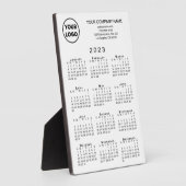 ホワイトデスクトップ上の2023年カレンダーのビジネスロゴ文字 フォトプラーク (側面)