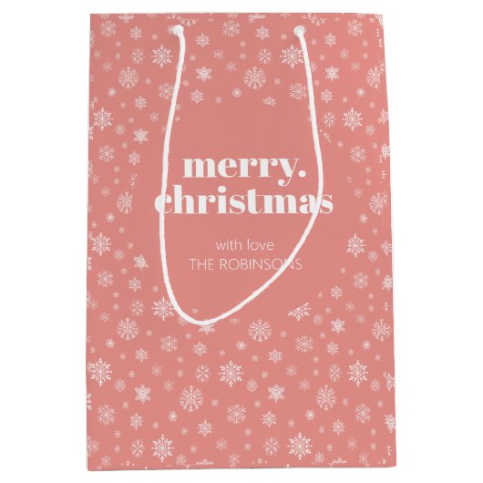 ホワイトピンクのメリークリスマススノーフレークパターン ミディアムペーパーバッグ (正面)