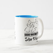 ホームプレーヤーに気づかれやすい不思議な猫 ツートーンマグカップ (正面右)