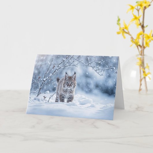 ボブキャットと雪の冬至 カード (黄色い花)