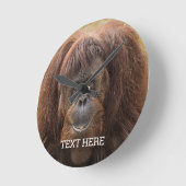ボルネオ・オランウータン美しい写真 ラウンド壁時計 (傾斜)