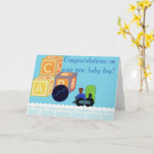 ボーイカードの新生児おめでとう カード (黄色い花)