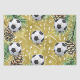 ボールを持つプレーヤーのためのサッカークリスマスをテーマにした 薄葉紙
