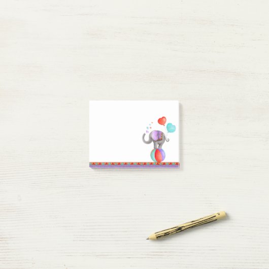 ボールアートの上のウィムジー象の紫色のポストそれをメモ ポストイット (デスク上)