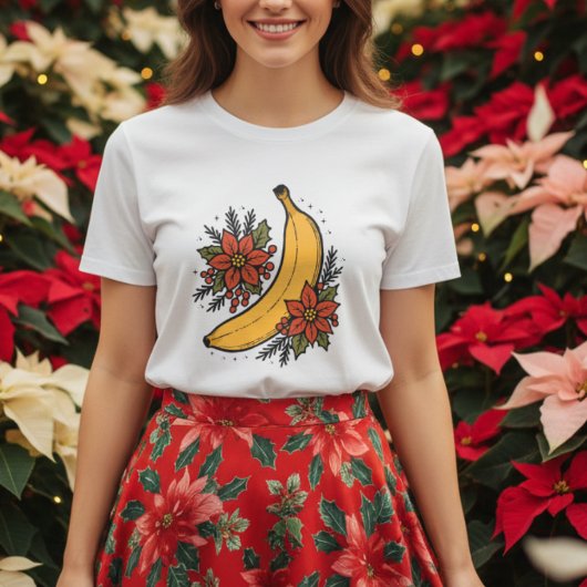 ポインセチアの花と一緒にクリスマスを祝うバナナ Tシャツ