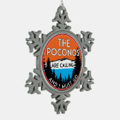 ポコノスが電話してきて、ペンシルバニアに行かねばならない スノーフレークピューターオーナメント (左)