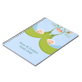 ポッドの男の子の2個のエンドウ豆はノートを結び付けます ノートブック (左側)