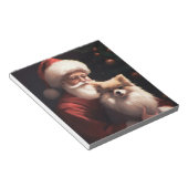 ポメラニア犬とサンタクロースフェスティバルクリスマス ノートパッド (アングル)