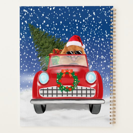 ポメラニア犬の犬が雪のクリスマスに車を運転 プランナー手帳 (裏面)