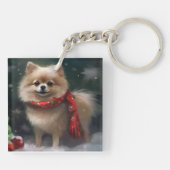 ポメラニア犬の犬が雪のクリスマス キーホルダー (裏面)
