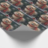 ポメラニア犬の犬が雪のクリスマス ラッピングペーパー (角)