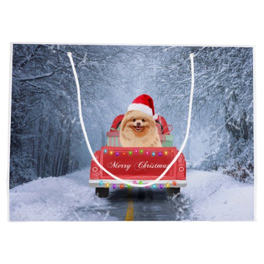 ポメラニア犬の犬が雪の中でクリスマストラックに座って ラージペーパーバッグ (裏面)