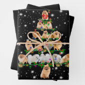 ポメラニア犬クリスマスツリーが懐中電灯で覆われている ラッピングペーパーシート (インサイチュ)