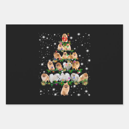 ポメラニア犬クリスマスツリーが懐中電灯で覆われている ラッピングペーパーシート (正面)