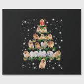 ポメラニア犬クリスマスツリーが懐中電灯で覆われている ラッピングペーパー (フラット)