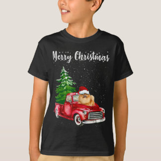ポメラニア犬ライディングレッドトラックメリークリスマスドッグロー Tシャツ