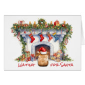 ポメラニア犬犬がサンタクリスマス暖炉を待つ (正面横)