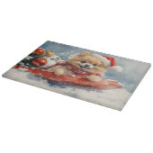 ポメラニア犬犬のソリで雪のクリスマス カッティングボード (角)