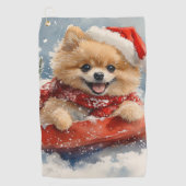ポメラニア犬犬のソリで雪のクリスマス ゴルフタオル (正面)