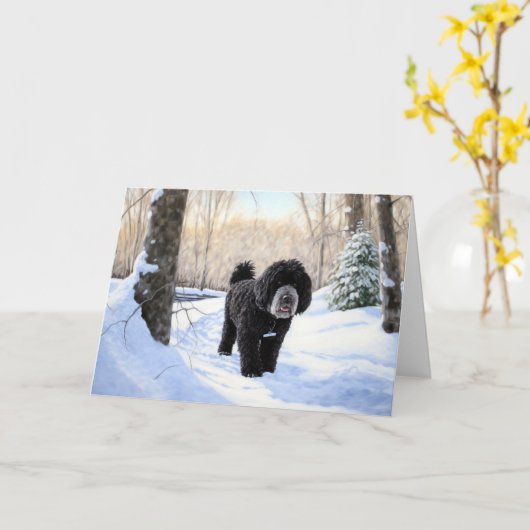 ポルトガルの水犬が雪のクリスマスを過ごした カード (黄色い花)