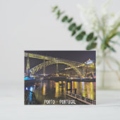 ポルト – ポルトガル。ドーロ川付近の夜景 ポストカード (スタンド正面)