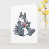 ポーカーでカードをプレイするオオカミ カード (黄色い花)