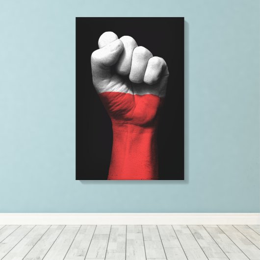 ポーランド国旗で握り拳を上げる キャンバスプリント (インサイチュ (ウッドフロア))